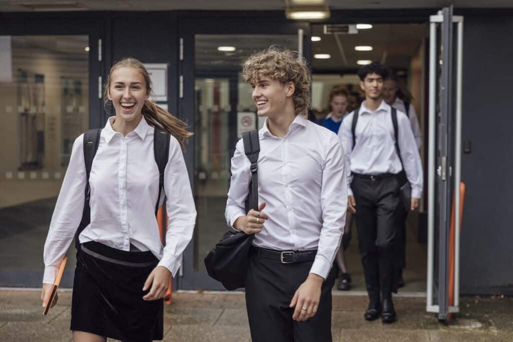Students walking together after school, character education in schools in action