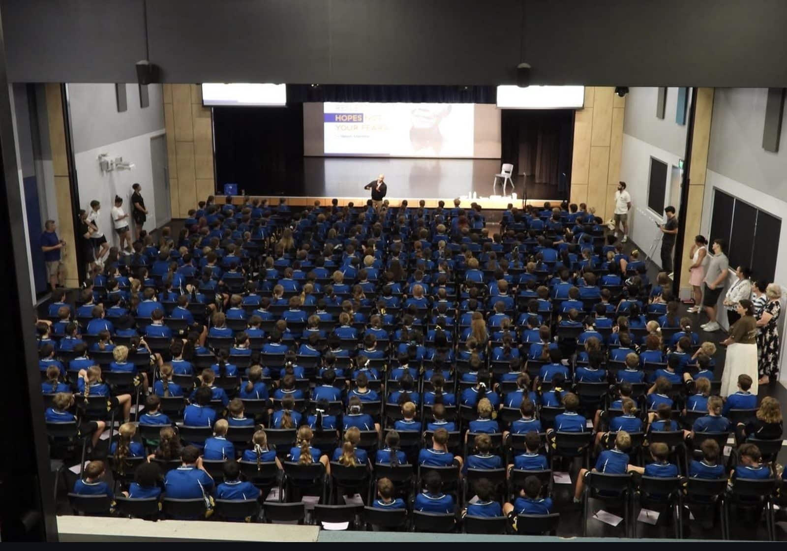 Glen Gerreyn speaking to a full school assembly at Albany Creek State High School in Brisbane